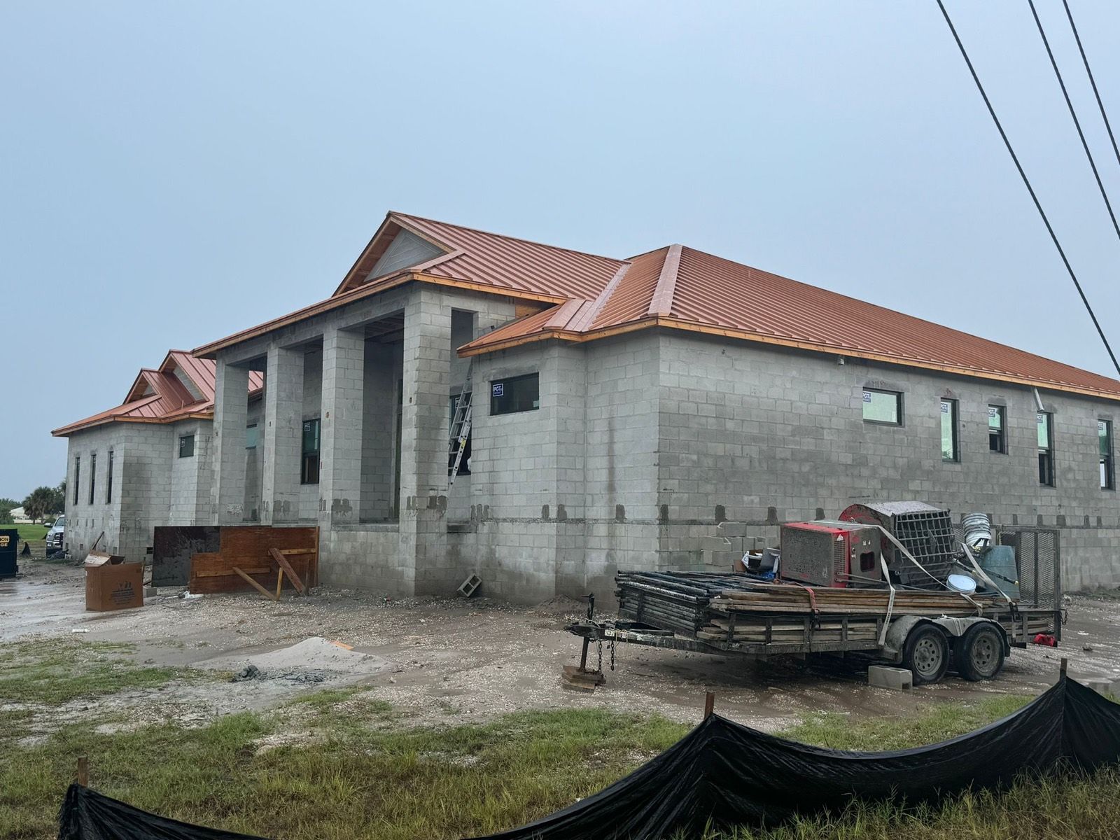 Copper-Tone Metal Roof on a New Block Home: on the job (2 of 4)