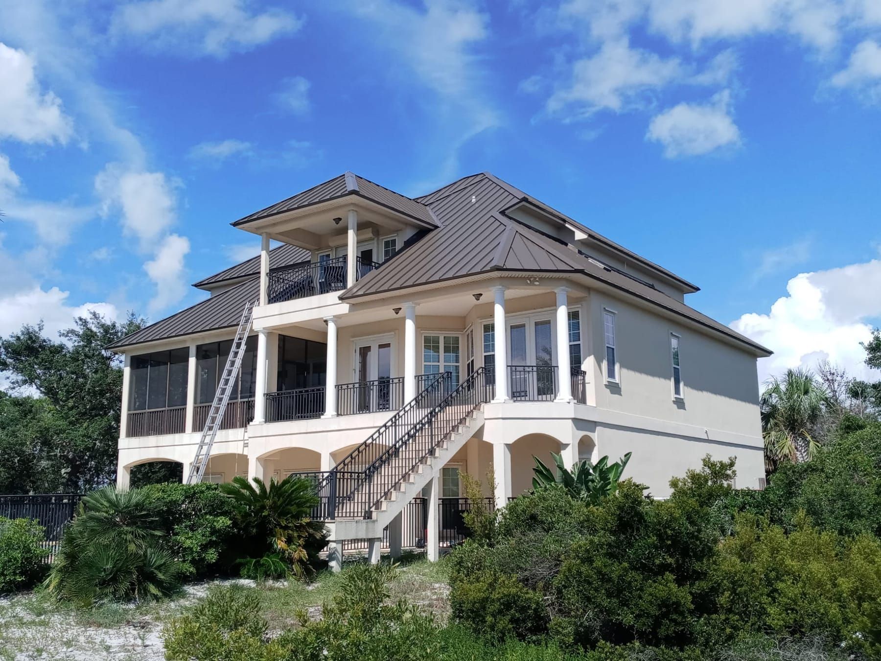 Metal roof on a three-story coastal home