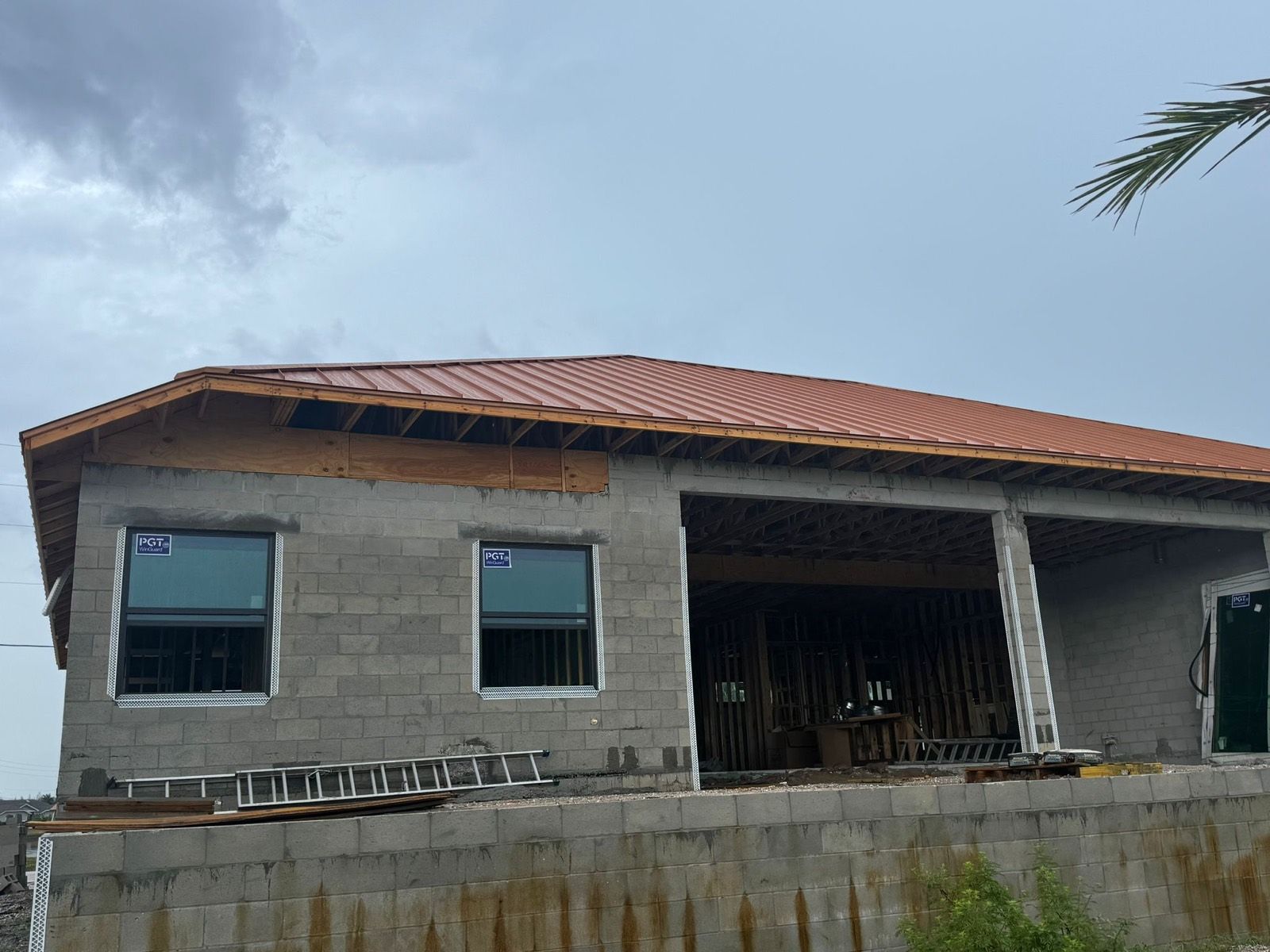 Copper-Tone Metal Roof on a New Block Home: on the job (4 of 4)